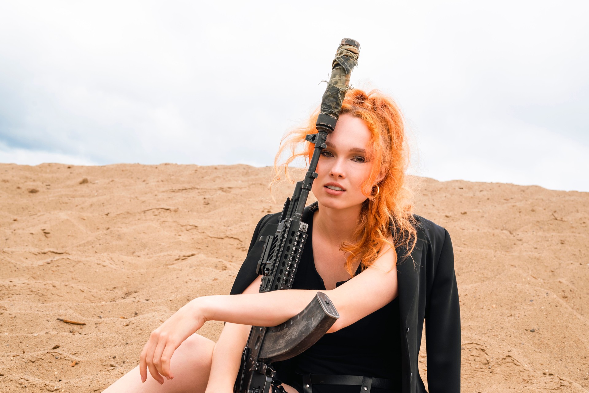 Outdoor Portrait of Redhead with Weapon